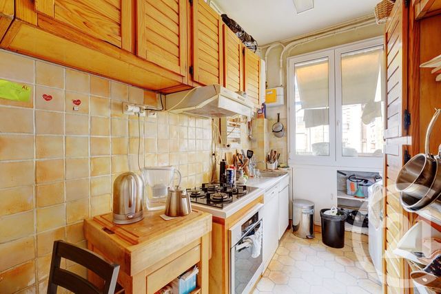 Afficher la photo en grand Appartement T5 à vendre - 5 pièces - 109,73 m2 - Paris - 75015 - ILE-DE-FRANCE